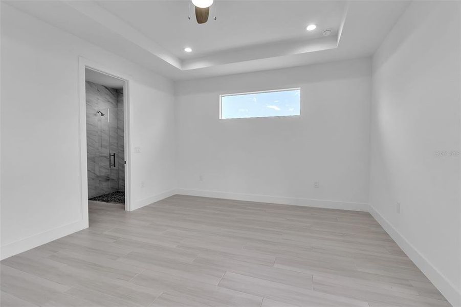 Spacious, unfurnished interior of a new home in , Punta Gorda (Image 49).