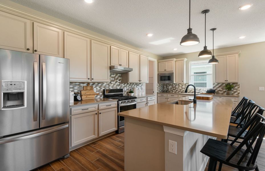Representative furnished interior of a home built from the Palmary by DiVosta in Talon Preserve on Palmer Ranch, Nokomis (Image 30).