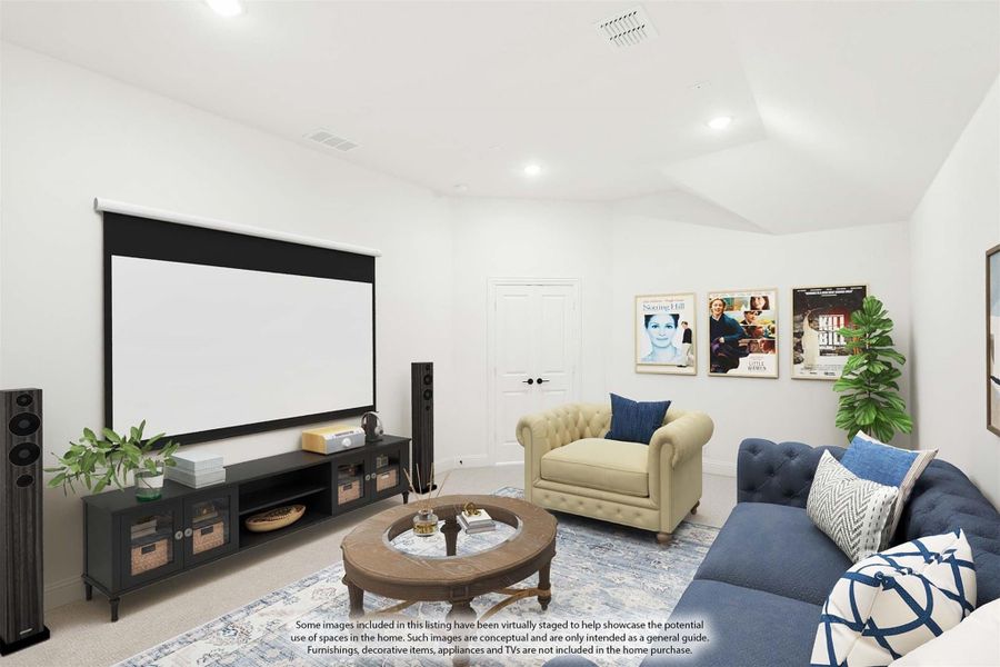 Media room with large projection screen, blue sofa, armchair, and movie posters on white walls