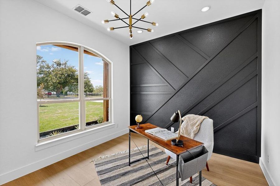 Home office featuring a decorative wall, a chandelier, light wood-style floors, and recessed lighting