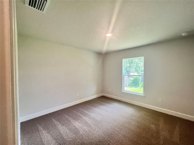 Spacious, unfurnished interior of a new home in Orange Blossom Hills, Summerfield (Image 15).