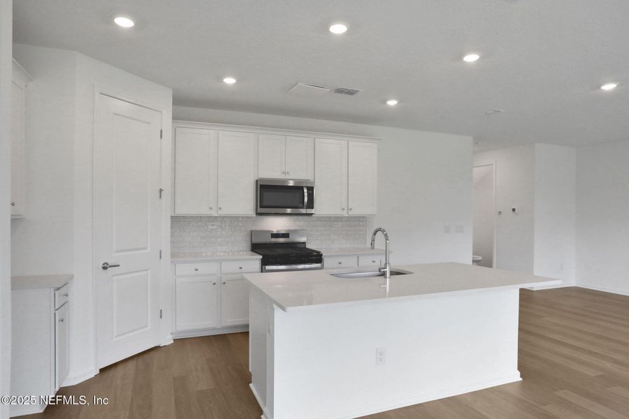 Furnished interior view inside a new home in TrailMark, St. Augustine (Image 11).