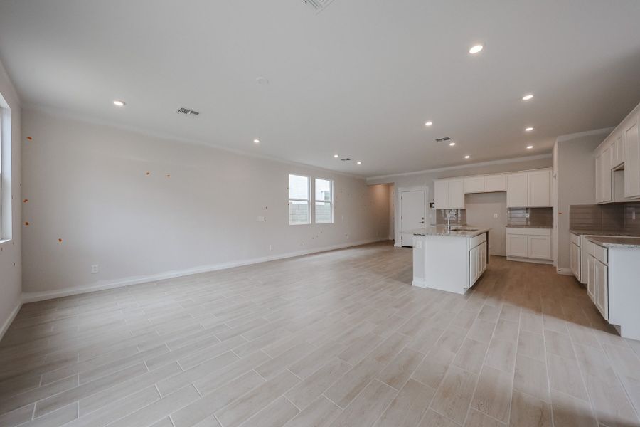 A large empty kitchen. A large empty kitchen.