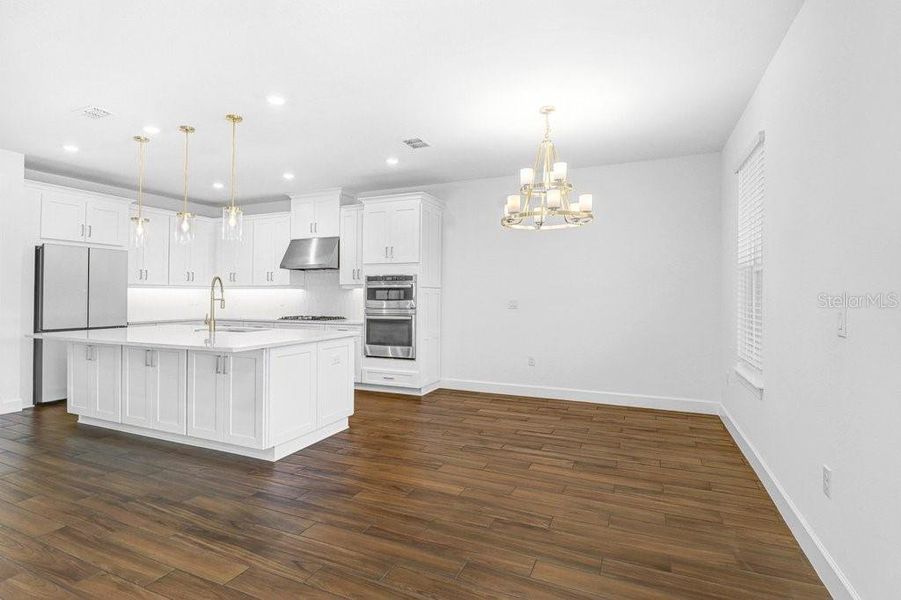Spacious, unfurnished interior of a new home in Esplanade at Artisan Lakes, Palmetto (Image 30).