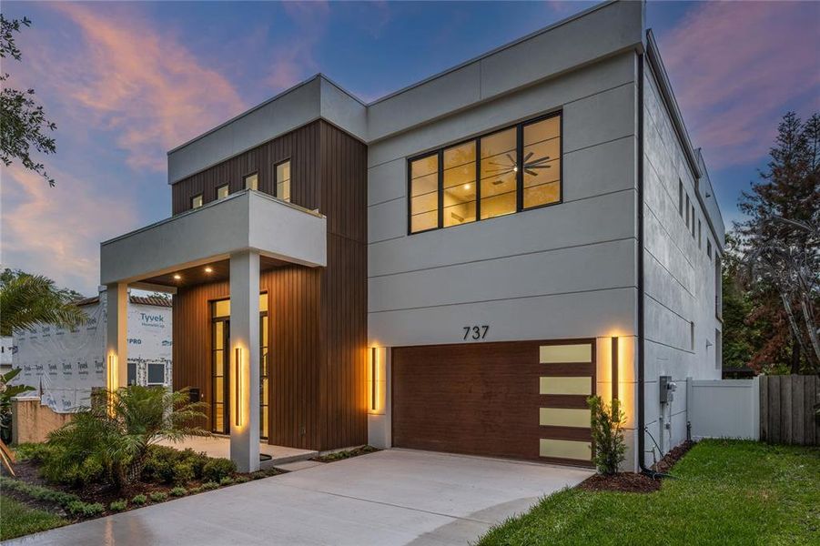 Front exterior of a new home in , Orlando, FL, highlighting curb appeal (Image 25).