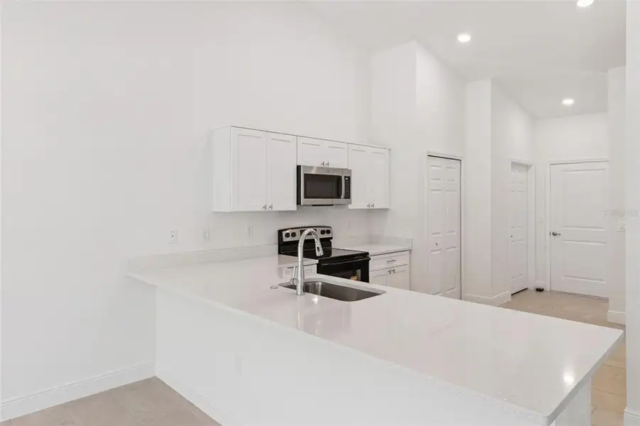 Furnished interior view inside a new home in , Yeehaw Junction (Image 6). Furnished interior view inside a new home in , Yeehaw Junction (Image 6).