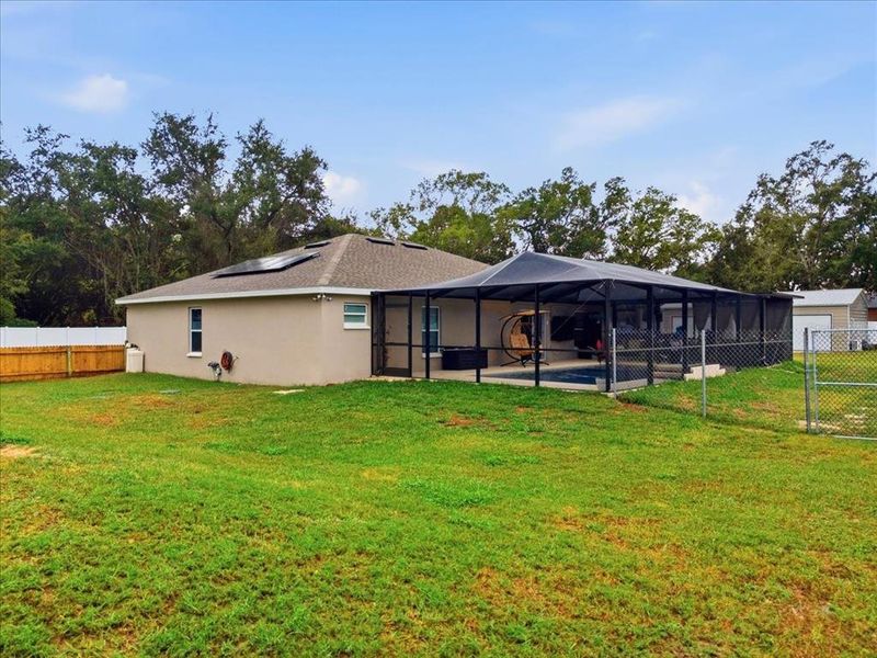 Exterior details and patio area of a home in , Auburndale (Image 33).