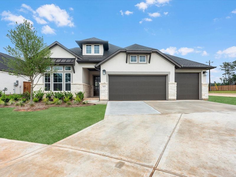 Front exterior of a new home in Clopton Farms, Montgomery, TX, highlighting curb appeal (Image 2). Front exterior of a new home in Clopton Farms, Montgomery, TX, highlighting curb appeal (Image 2).