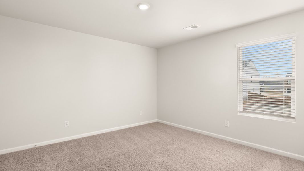 Representative unfurnished interior of a home built from the Penwell by D.R. Horton in Bridle Creek, Locust Grove (Image 20).