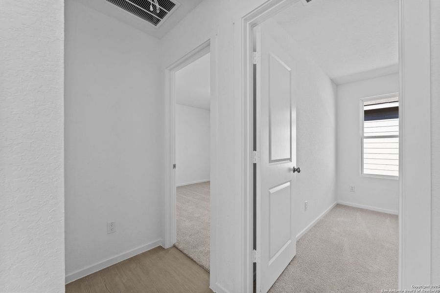 Spacious, unfurnished interior of a new home in Randolph Crossing: Cottage Collection, Converse (Image 22).