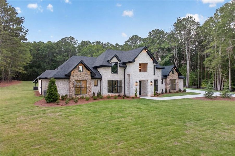 Front exterior of a new home in , Monroe, GA, highlighting curb appeal (Image 26).