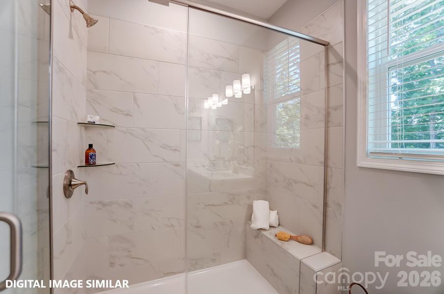 PRIMARY BEDROOM EN SUITE (MAIN LEVEL) - Photo is for representation purposes of floorplan only - colors, finishes, and options will vary