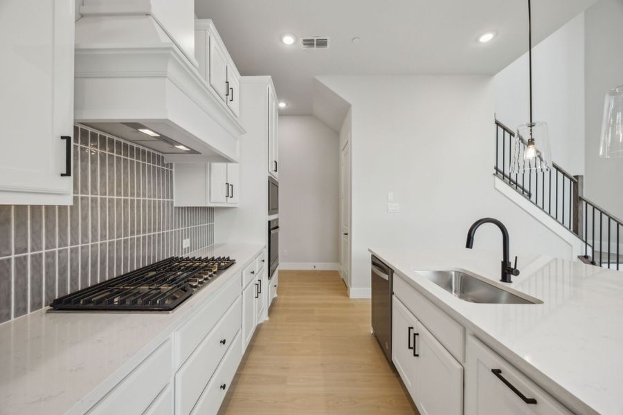 Furnished interior view inside a new home in Newman Village Townhomes, Frisco (Image 5).