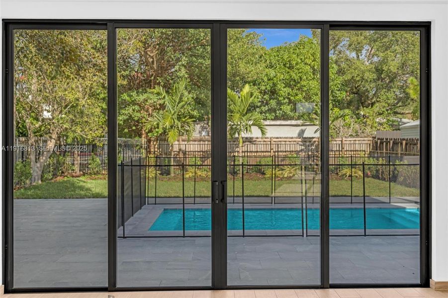 Exterior details and patio area of a home in , Miami (Image 4).