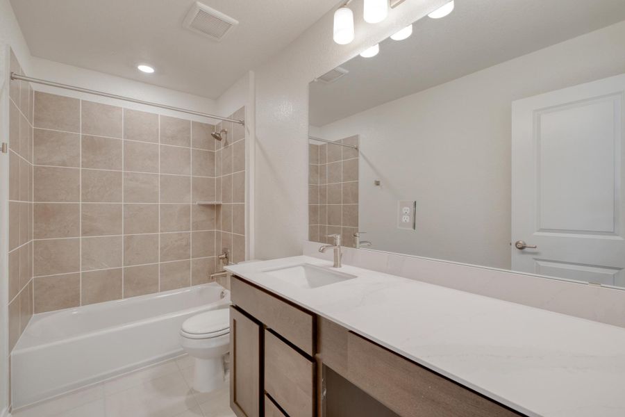 Furnished interior view inside a new home in River Bluff, Leander (Image 8).