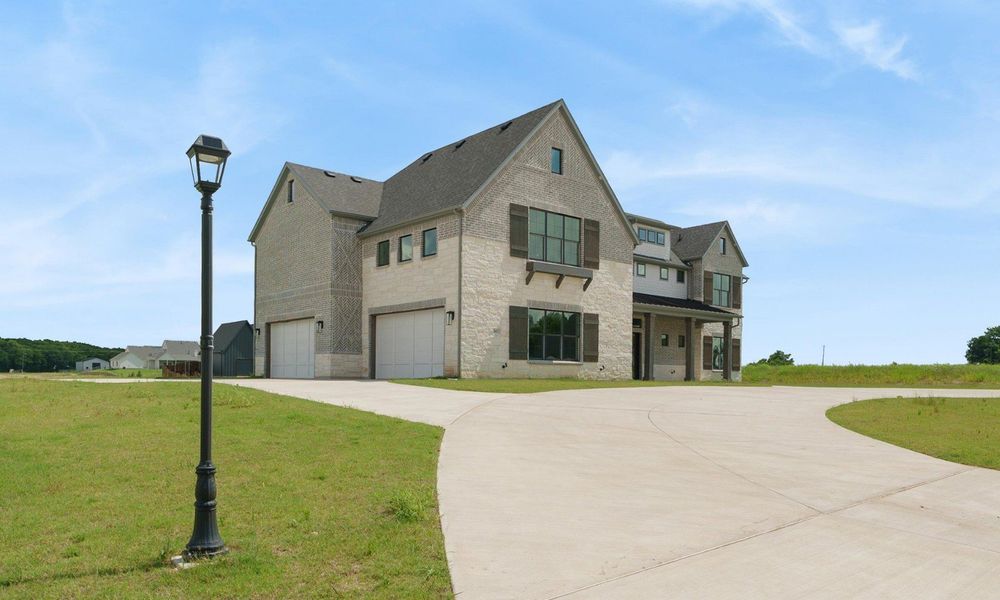 Front exterior of a new home in Capitol Hill, Anna, TX, highlighting curb appeal (Image 2).