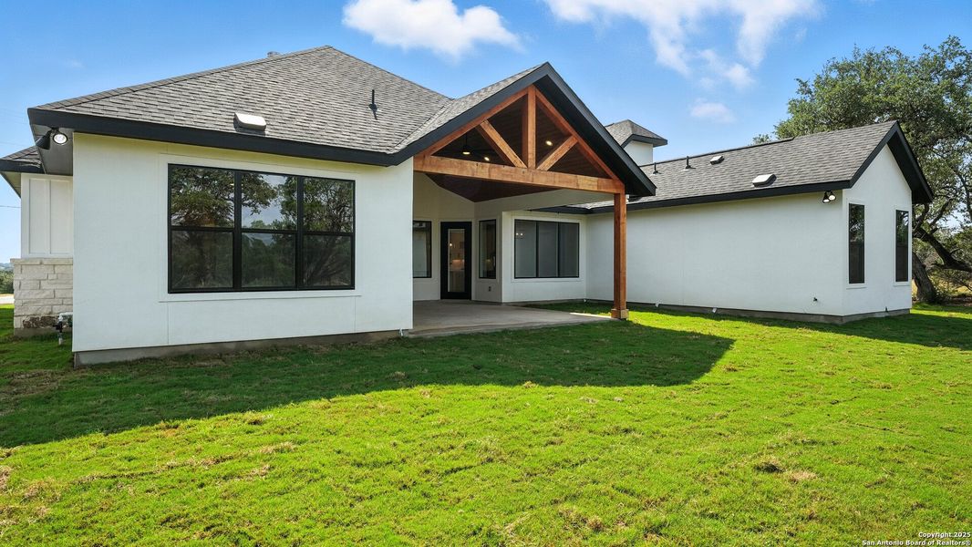 Front exterior of a new home in , Spring Branch, TX, highlighting curb appeal (Image 24).
