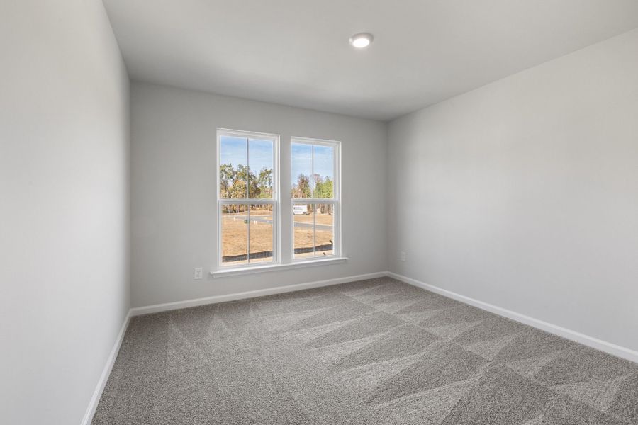 Spacious, unfurnished interior of a new home in Poets Walk, Whitsett (Image 14).