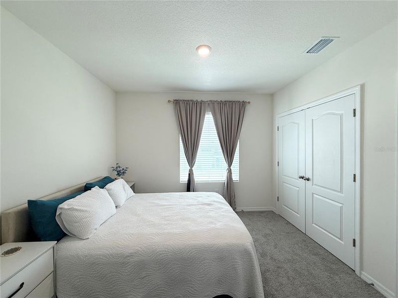 Furnished interior view inside a new home in , Kissimmee (Image 19).