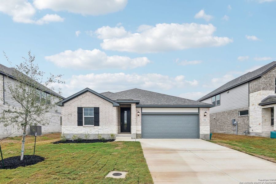 Front exterior of a new home in Carmel Ranch, Schertz, TX, highlighting curb appeal (Image 21).