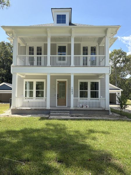 Exterior details and patio area of a home in , Awendaw (Image 7). Exterior details and patio area of a home in , Awendaw (Image 7).