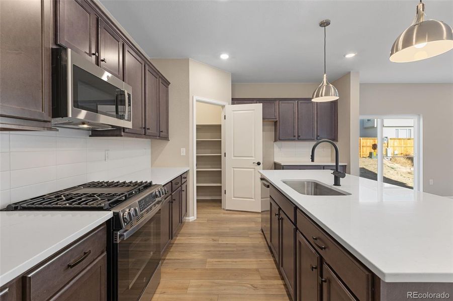 Furnished interior view inside a new home in The Cottages Collection at Ridgeline Vista, Brighton (Image 6).