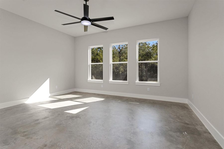 The spacious primary bedroom offers a peaceful retreat with plenty of room to relax and unwind. Large windows frame serene views of the backyard, allowing natural light to pour in while creating a calm, airy atmosphere.Designed for comfort and privacy, the suite seamlessly connects to a well-appointed en suite bath, providing a private sanctuary to start and end your day. This inviting space perfectly balances size, light, and functionality for everyday living.