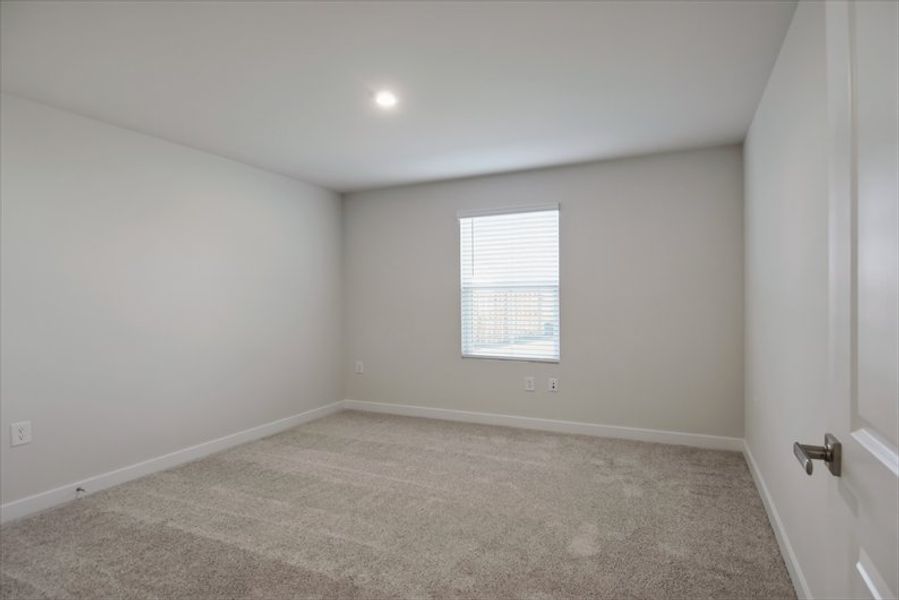 Spacious, unfurnished interior of a new home in Reidville Town Center Cottages, Duncan (Image 14).