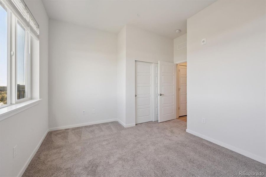 Spacious, unfurnished interior of a new home in Condo Collection at Grand Vue at Interlocken, Broomfield (Image 9).