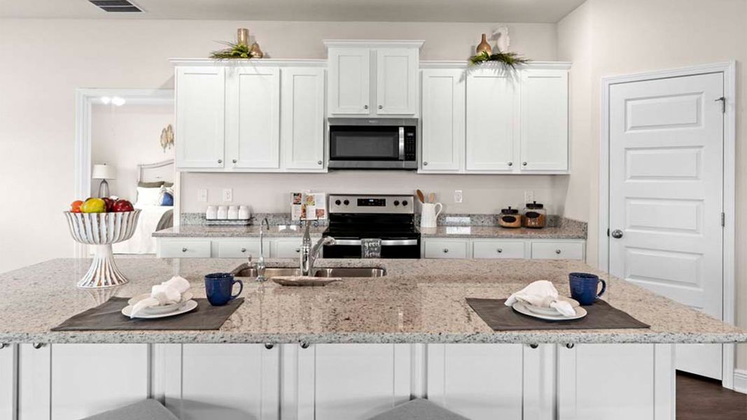 Representative furnished interior of a home built from the The Camden by D.R. Horton in Liberty, Panama City (Image 17).