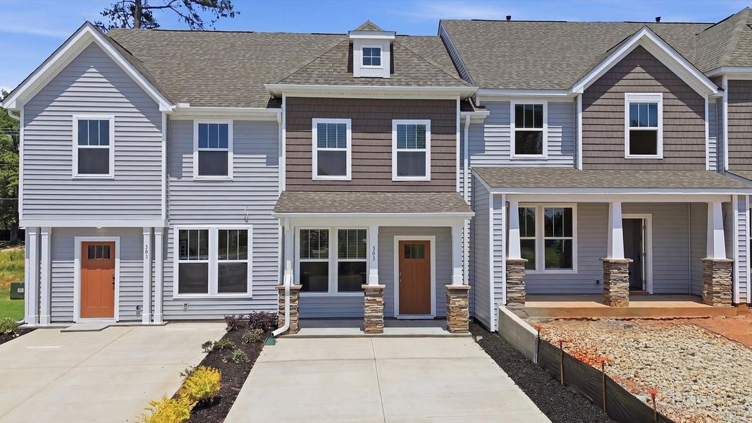 Front exterior of a new home in Clarke Townes, Anderson, SC, highlighting curb appeal (Image 21). Front exterior of a new home in Clarke Townes, Anderson, SC, highlighting curb appeal (Image 21).