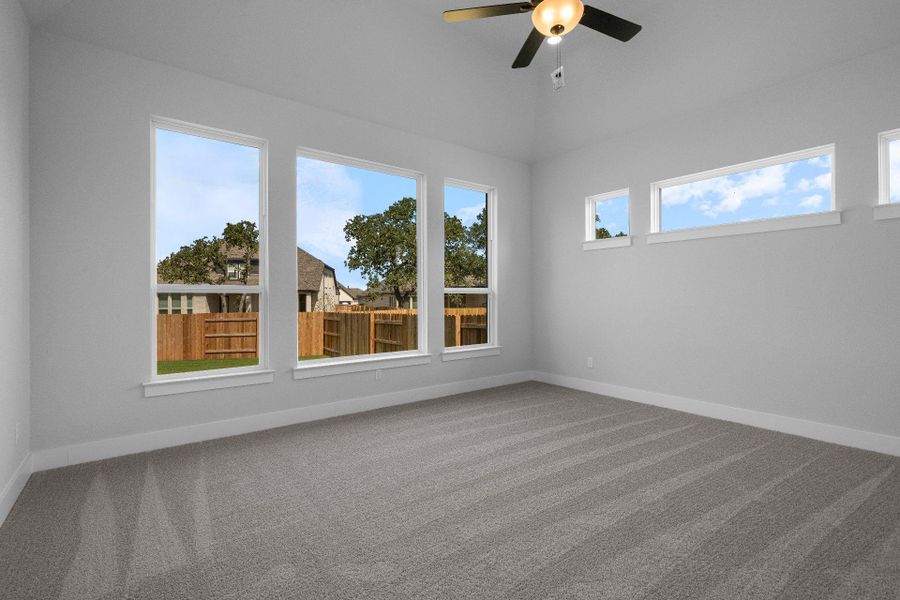 Primary Bedroom with elevated ceiling