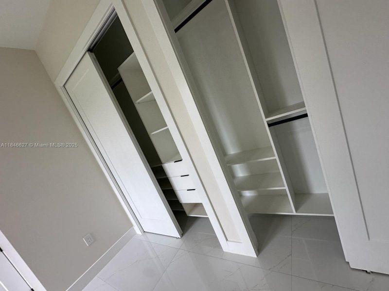 Cabinetry with integrated drawers and shelving