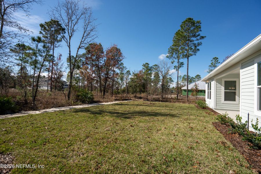 Exterior details and patio area of a home in SilverLeaf, St. Augustine (Image 22).