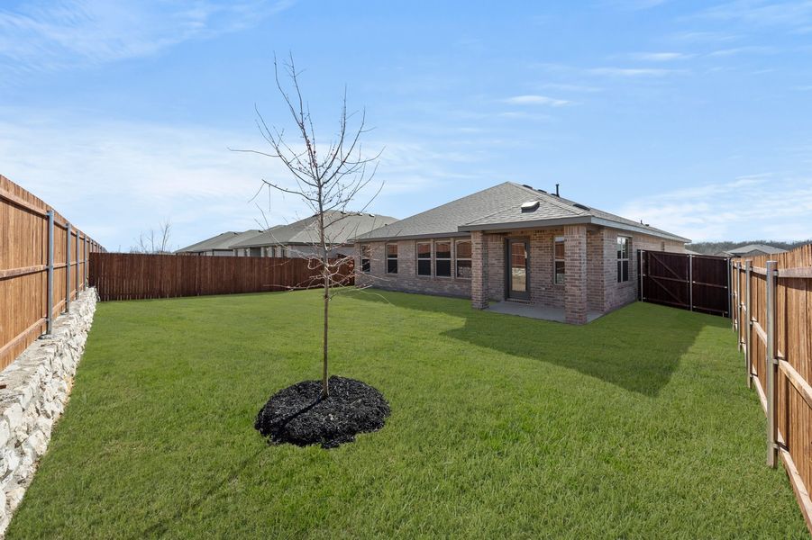 Front exterior of a new home in Northspur, Terrell, TX, highlighting curb appeal (Image 27). Front exterior of a new home in Northspur, Terrell, TX, highlighting curb appeal (Image 27).