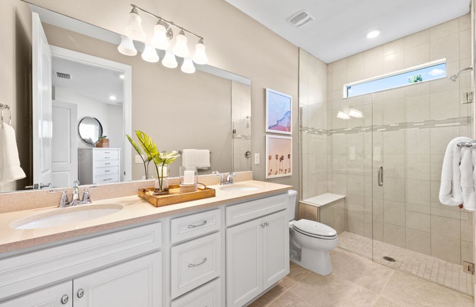 Furnished interior view inside a new home in BeachWalk by Manasota Key, Englewood (Image 9).