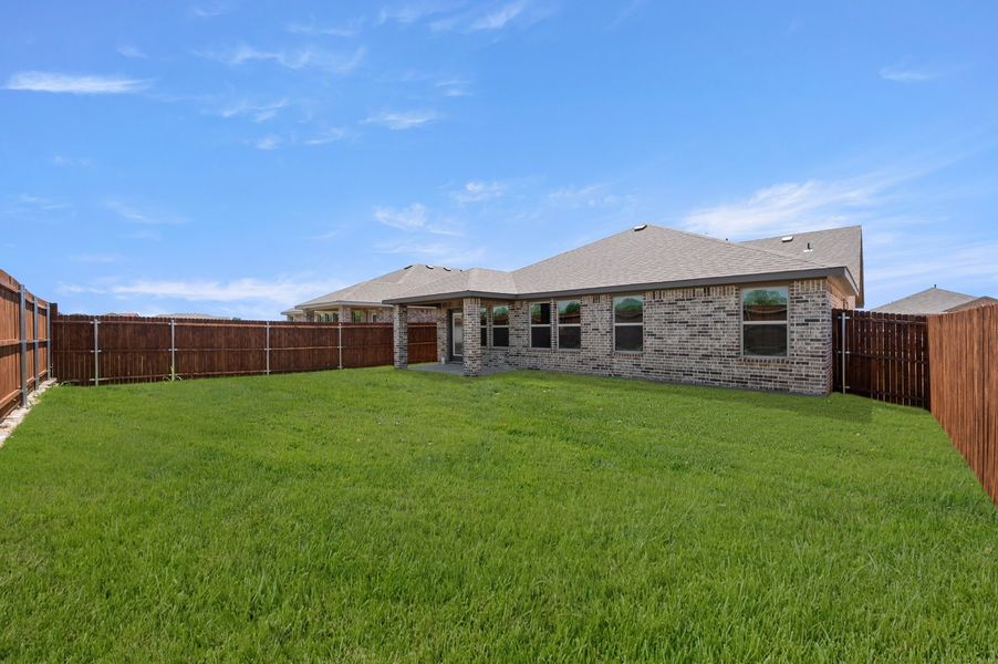 Front exterior of a new home in Baker Farms, Cleburne, TX, highlighting curb appeal (Image 26).