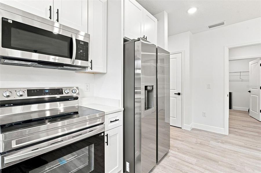 Furnished interior view inside a new home in , Deland (Image 10).