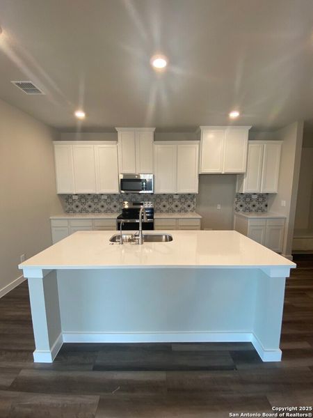 Furnished interior view inside a new home in Highland Ridge, New Braunfels (Image 12). Furnished interior view inside a new home in Highland Ridge, New Braunfels (Image 12).
