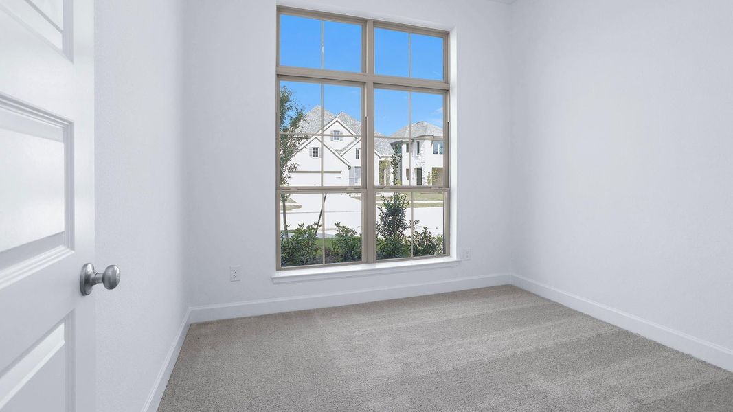 Spacious, unfurnished interior of a new home in The Groves 45', Humble (Image 10).