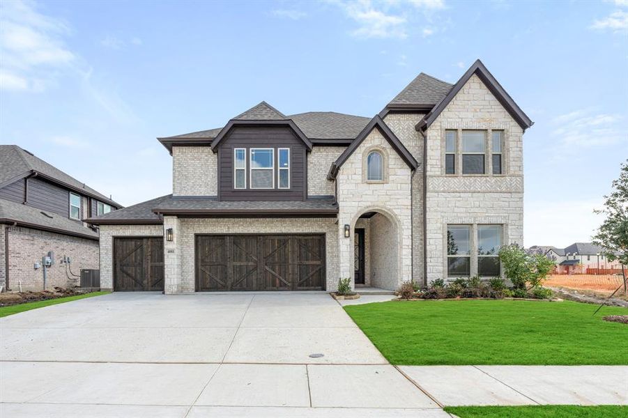 Front exterior of a new home in Mosaic, Celina, TX, highlighting curb appeal (Image 1). Front exterior of a new home in Mosaic, Celina, TX, highlighting curb appeal (Image 1).
