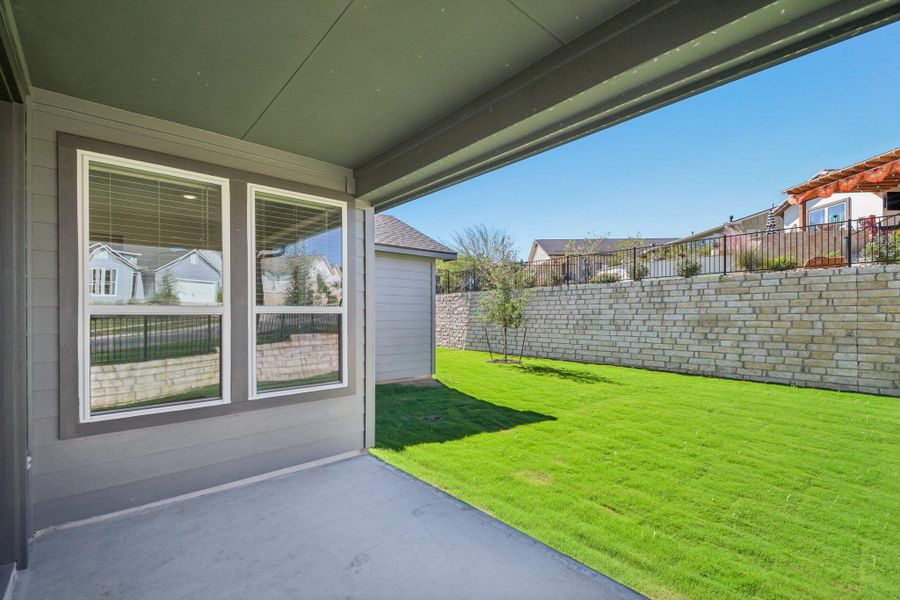 Fenced backyard featuring a patio Fenced backyard featuring a patio