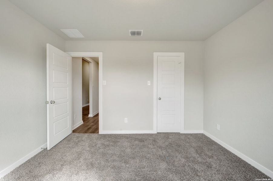 Spacious, unfurnished interior of a new home in Winding Brook, San Antonio (Image 32).