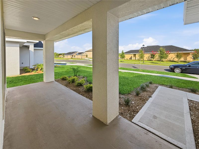 Exterior details and patio area of a home in Harmony Central, St. Cloud (Image 2). Exterior details and patio area of a home in Harmony Central, St. Cloud (Image 2).