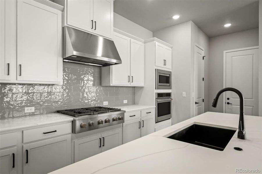 Furnished interior view inside a new home in Revel Crossing at Wolf Ranch – The Outlook Collection, Colorado Springs (Image 18).