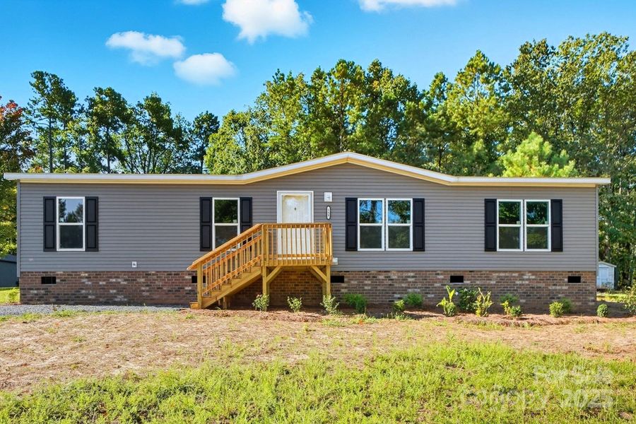 Front exterior of a new home in , Kings Mountain, NC, highlighting curb appeal (Image 2). Front exterior of a new home in , Kings Mountain, NC, highlighting curb appeal (Image 2).