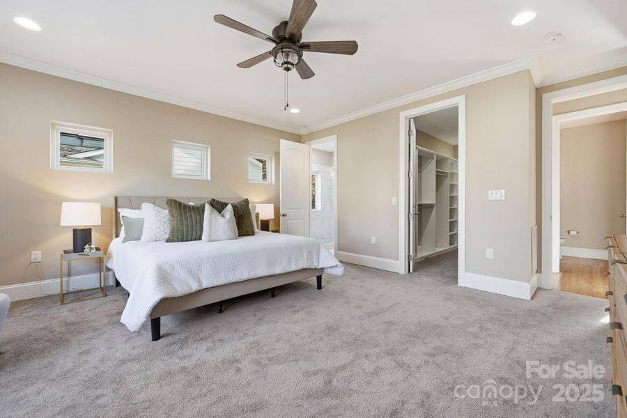 Primary suite entry showcasing the spacious layout and direct access to the spa-inspired bath. Primary suite entry showcasing the spacious layout and direct access to the spa-inspired bath.