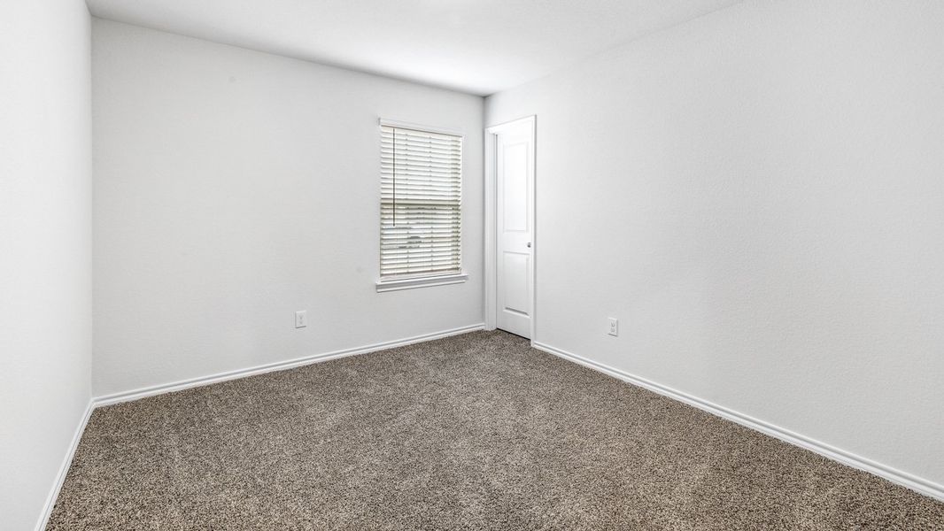 Spacious, unfurnished interior of a new home in Stonewyck Farms, Ennis (Image 20).