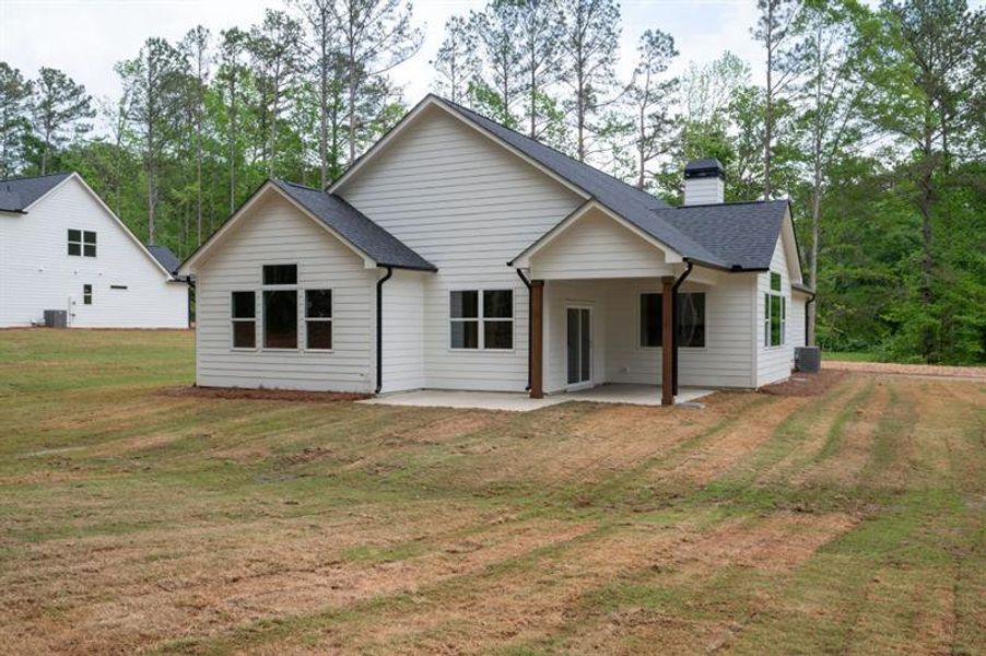 Front exterior of a new home in , Dallas, GA, highlighting curb appeal (Image 24).