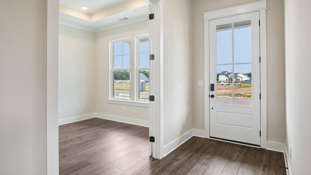 Interior front entry with access to study room Interior front entry with access to study room